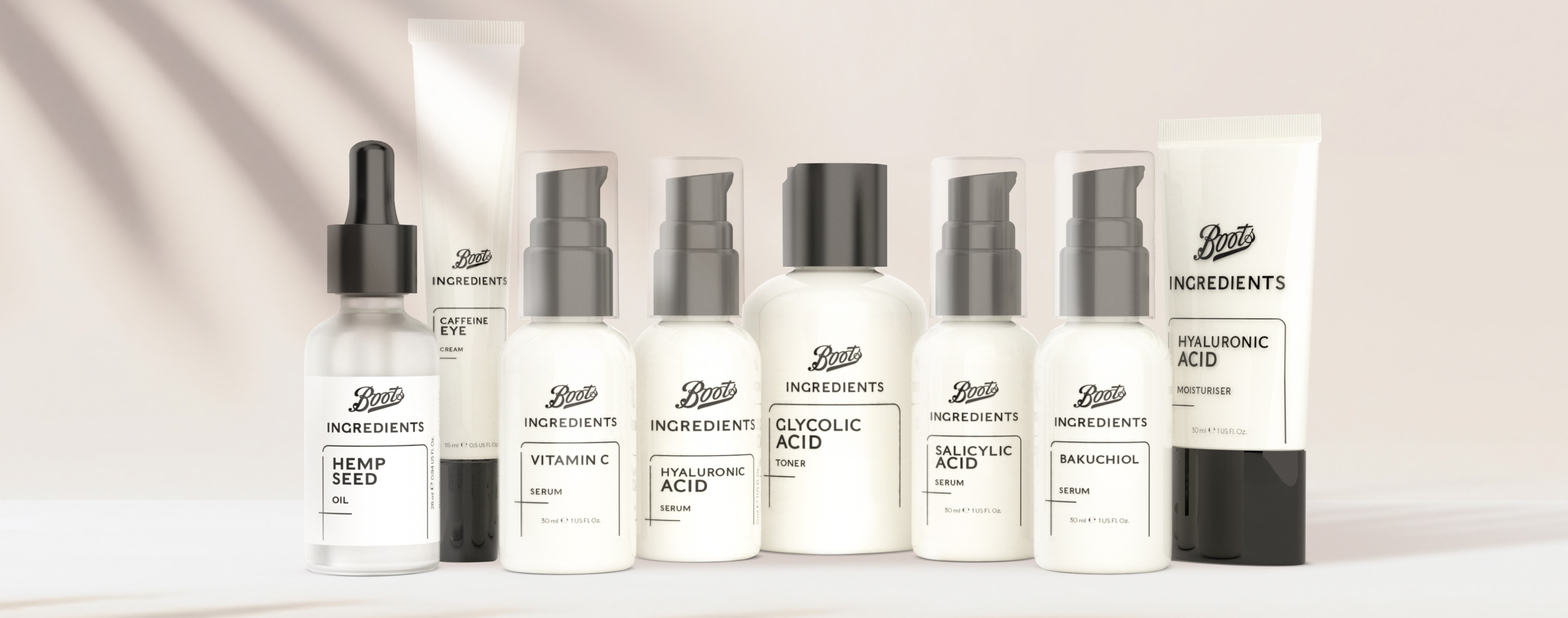 Selection of Boots products in white bottles on a satin pink background.